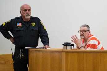 Photo/Quintin Ellison- From left: Sgt. Doug Hampton of the Macon County Sheriff’s Office and defendant Paul Eugene Snow.