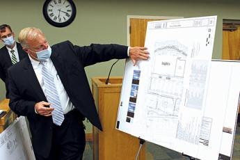 Press photo/Jake Browning - Ingles project manager Preston Kendall shows the Franklin Town Council a schematic of the store’s proposed new location at Holly Springs Plaza.