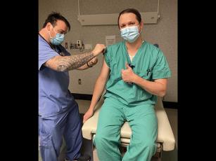 Photo submitted Tommie Blalock, ICU/Medsurg team leader at Angel Medical Center, was the first to be vaccinated at the hospital.