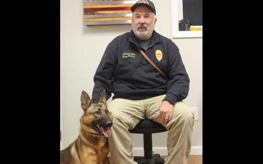 Press photo/Jake Browning - K9 Ava with handler Larry Pickens, assistant chief at Cowee Volunteer Fire and Rescue.