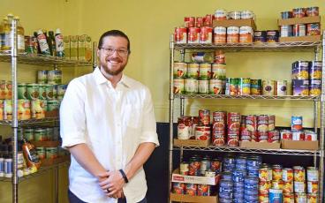 Pastor Bradley Lisk at Bethel United Methodist Church’s new food pantry offered in partnership with MANNA Food Bank.