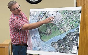 Town Planner Justin Setser reviews a map of the Whitmire property (Sunnyside Park) during a called meeting of the Franklin Town Council on Aug. 30.