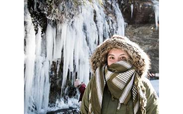 Photo/Bob Scott - Hannah Post, of Tampa, Florida, dressed for the 12-degree weather at Bridal Veil Falls on Saturday.