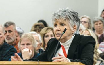 Photo/Bob Scott - Frieda Bennett speaks about the Highlands PreK project during the March 14 Macon County Board of Commissioners meeting.