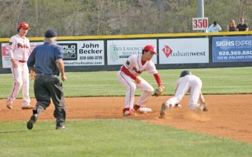 Press photo/Will Woolever - Junior second baseman Malachi Hayes applies a tag in Franklin’s 4-2 victory over North Buncombe at McConnell Field April 6. 
