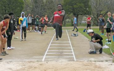 Press photo/Will Woolever Sophomore Eli Brown competes in the long jump at Rabun Gap April 13. 