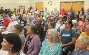 Press photo/Thomas Sherrill - A packed house was in attendance for the Sept. 12 meeting of the Fontana Regional Library’s Board of Trustees at the Macon County Public Library.