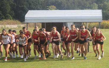 Press photo/Will Woolever - Franklin’s female distance runnners leave the starting line at Kituwah Sept. 16. 