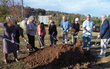 Press photo/Mia Overton - Representatives from the Folk Heritage Association’s Women’s History Trail and the Town of Franklin joined together on Oct. 27 to break ground for the new “Sowing the Seeds of the Future” sculpture to be installed next spring.