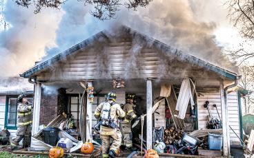 Photo/Bob Scott The McConnell family was able to safely escape a fire at their Roller Mill Road home on Friday.