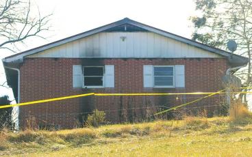 Press photo/Thomas Sherrill - The investigation into the deadly Jan. 4 fire at this Prentiss Bridge Road home continues.