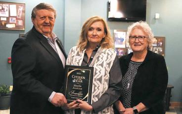 Photo/Eric Haggart - Sheila Jenkins (center) of No Wrong Door was named Citizen of the Year at the Chamber of Commerce awards banquet on Feb. 27. Also pictured are Ronnie Beale, who presented the award, and Dinah Mashburn, No Wrong Door board president.