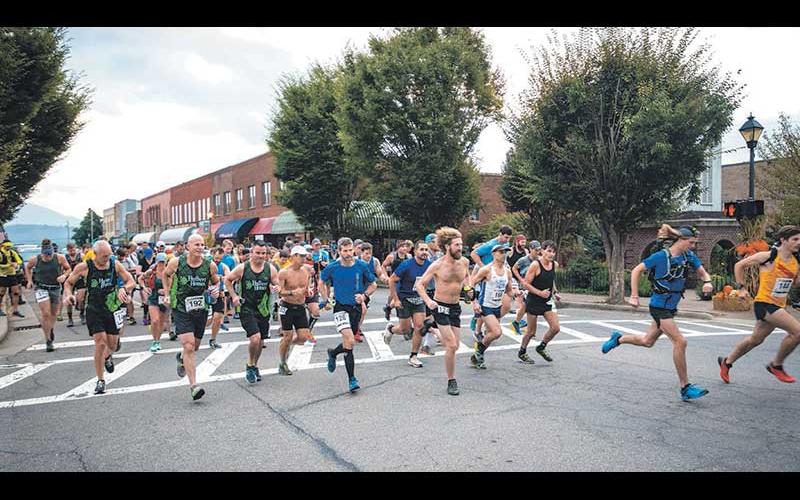 Stephan Pruitt Photography - The Naturalist starts in downtown Franklin and it’s 3 1/2 miles until runners reach the Bartram Trail at Wallace Branch. A record number of runners participated Saturday in the 25K and 50K races.