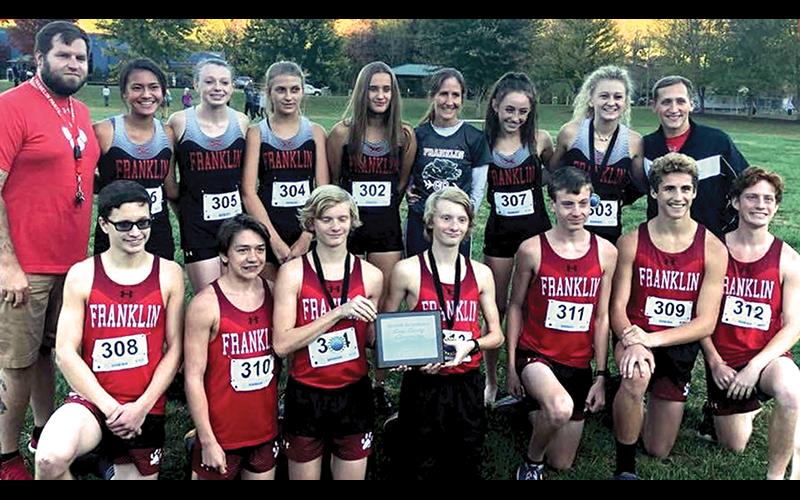 Photo submitted Franklin’s boys cross-country team won its first conference title since 2014, while the girls finished third. Front row, from left: Hunter Cabe, Ethan Farrell, Nathan Stamey, Ethan Stamey, Andrew Garrison, Aiden Carpenter, Nik Payne. Back row: assistant coach Walter Dailey, Olivia Owl, Mykayla McClure, Ava May, Hailey Bryant, coach Rita Esterwood, Maria Sgro, Dylan Garcia, assistant coach Kyle Brown. 