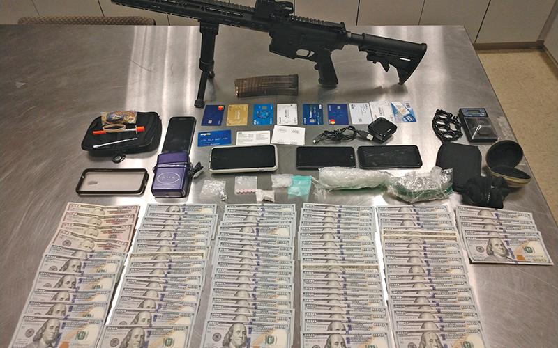 Photo submitted The suspect was driving on Sylva Road with $8,600 in cash, 109 grams of meth and an AR-15 rifle in his vehicle.