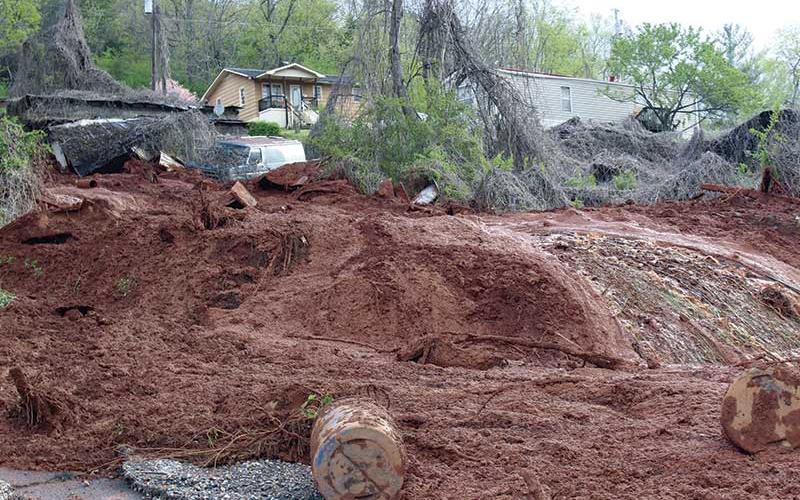 Press photo/Jake Browning - This mudslide near Chavez Road was one of eight caused by the estimated 5 inches of rain that swamped the county.