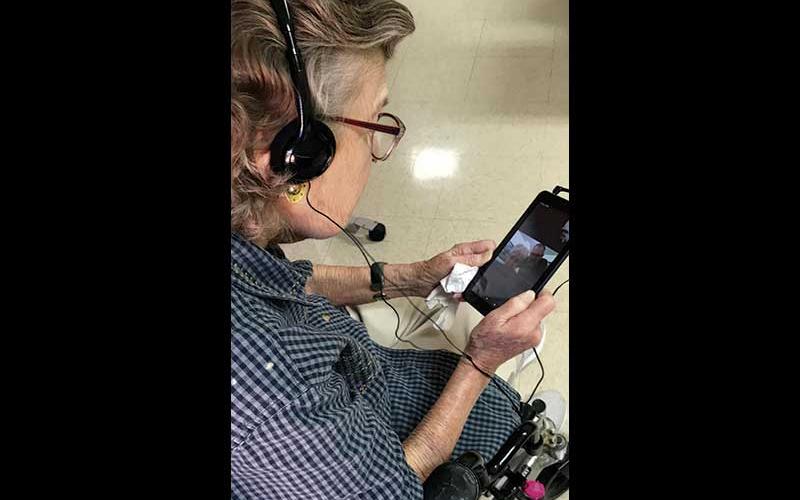 Photo submitted - Ann Clark, a resident of Macon Valley Nursing and Rehabilitation Center, uses her new tablet to Skype with her family.