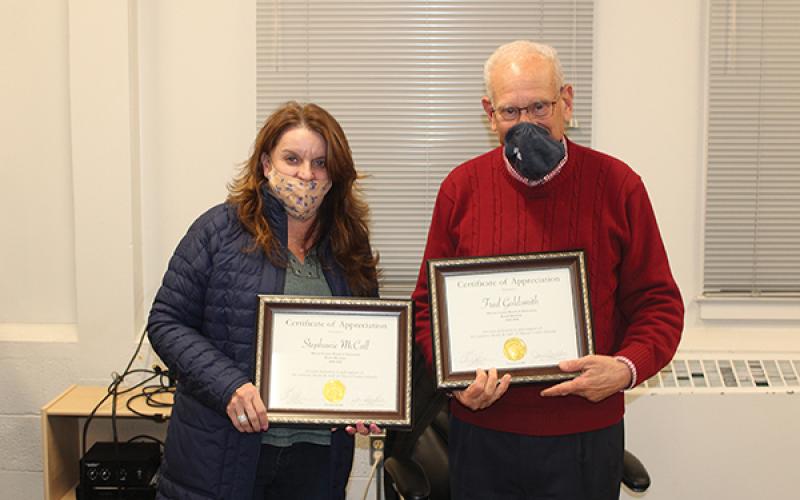 Press photo/Jake Browning - Stephanie MCall and Fred Goldsmith were presented with certificates of recognition of their work on the board.