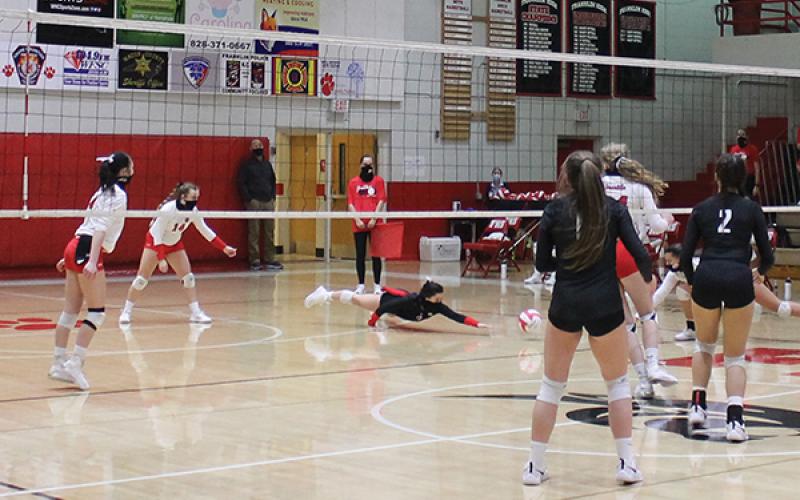 Press Photo/Will Woolever - Senior libero Amy Tippett tries to dig out an attack in a game against Pisgah last week.