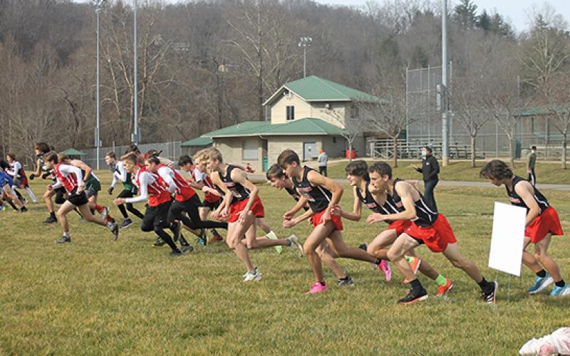 Press Photo/Will Woolever - The Franklin boys cross country team (black shirts) gets off the line at the Mountain Six Conference Championship meet in Cullowhee Jan. 6. The team qualified for its fourth straight state championship meet after fininshing second at the 2-A West Regional meet Jan. 15