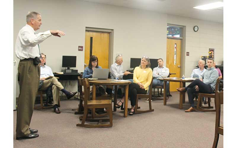 Press photo/Thomas Sherrill - Commissioner Gary Shields, left, conducts the Business Advisory Council meeting on Wednesday, April 26, in the Franklin High School library. 