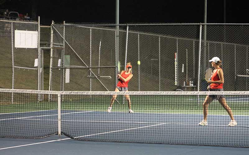 Press photo/Will Woolever  - Juniors Abigail Angel (left) and Kate Phillips are pictured in the No. 1 doubles match vs. Atkins Oct. 25