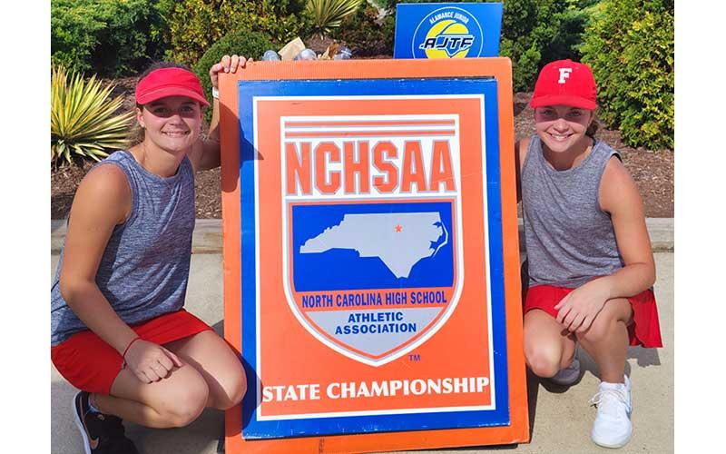 Press photo/Will Woolever  - Franklin’s State Individual Tournament qualifiers are pictured at the Burlginton Tennis Center Oct. 27. Senior 3A West Regional Champions Lydia (left) and Laura Holland.