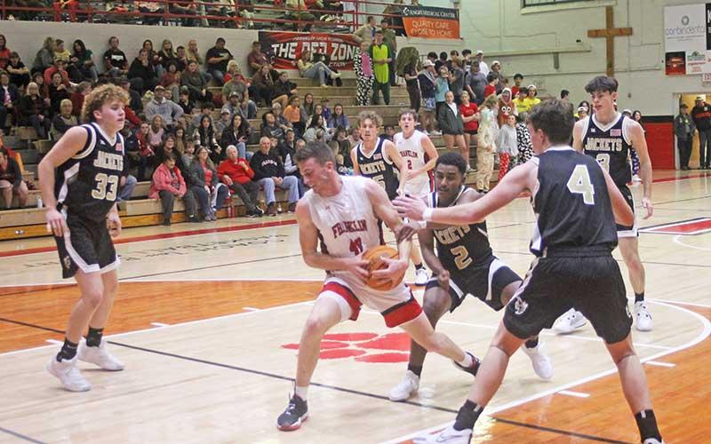 Press photo/Will Woolever - Senior center Braxton Deal protects the ball from Hayesville Dec. 8 on Tom Raby Court.